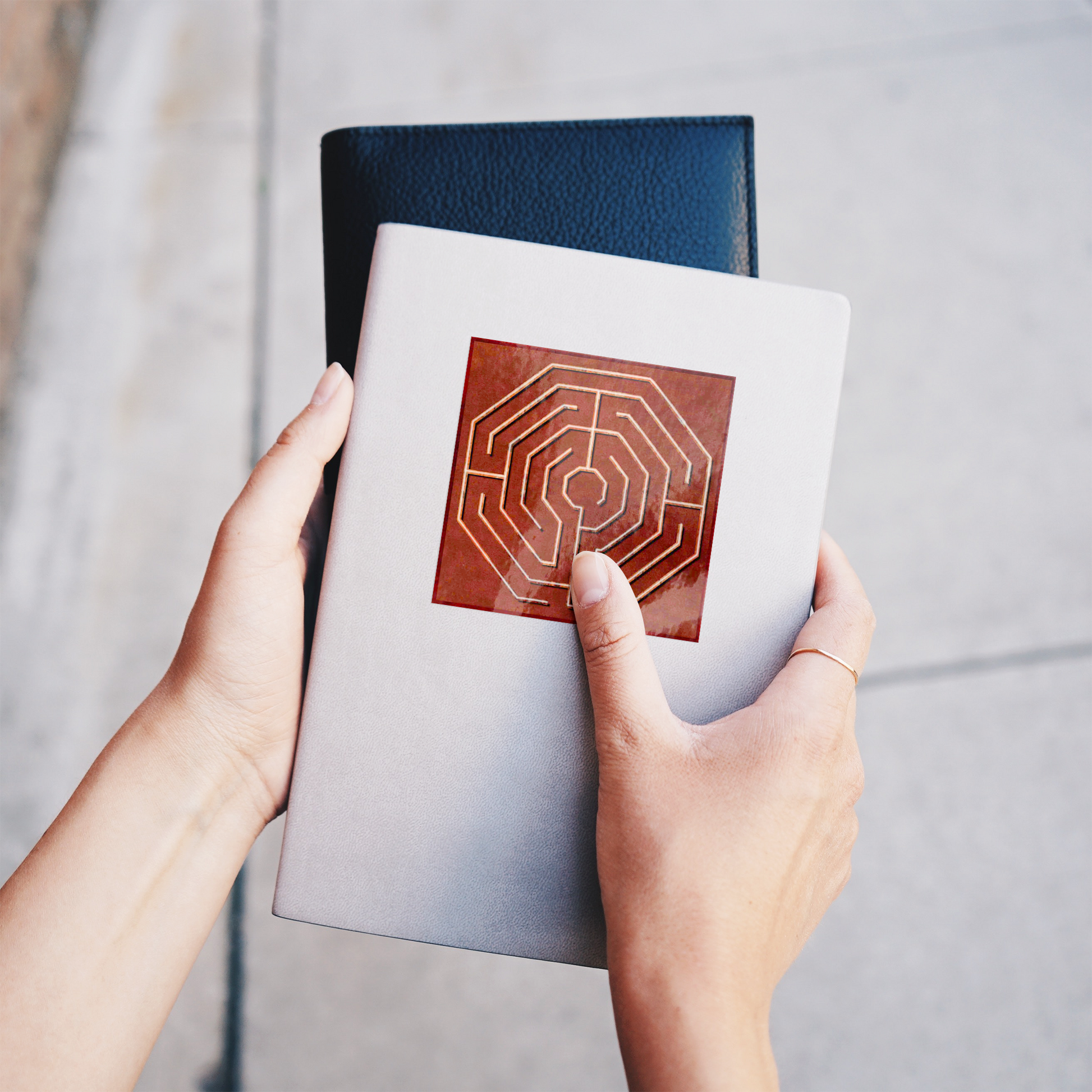 Octogon_Labyrinth_Sticker_WhiteSquareSticker_Notebook_Mockup.png