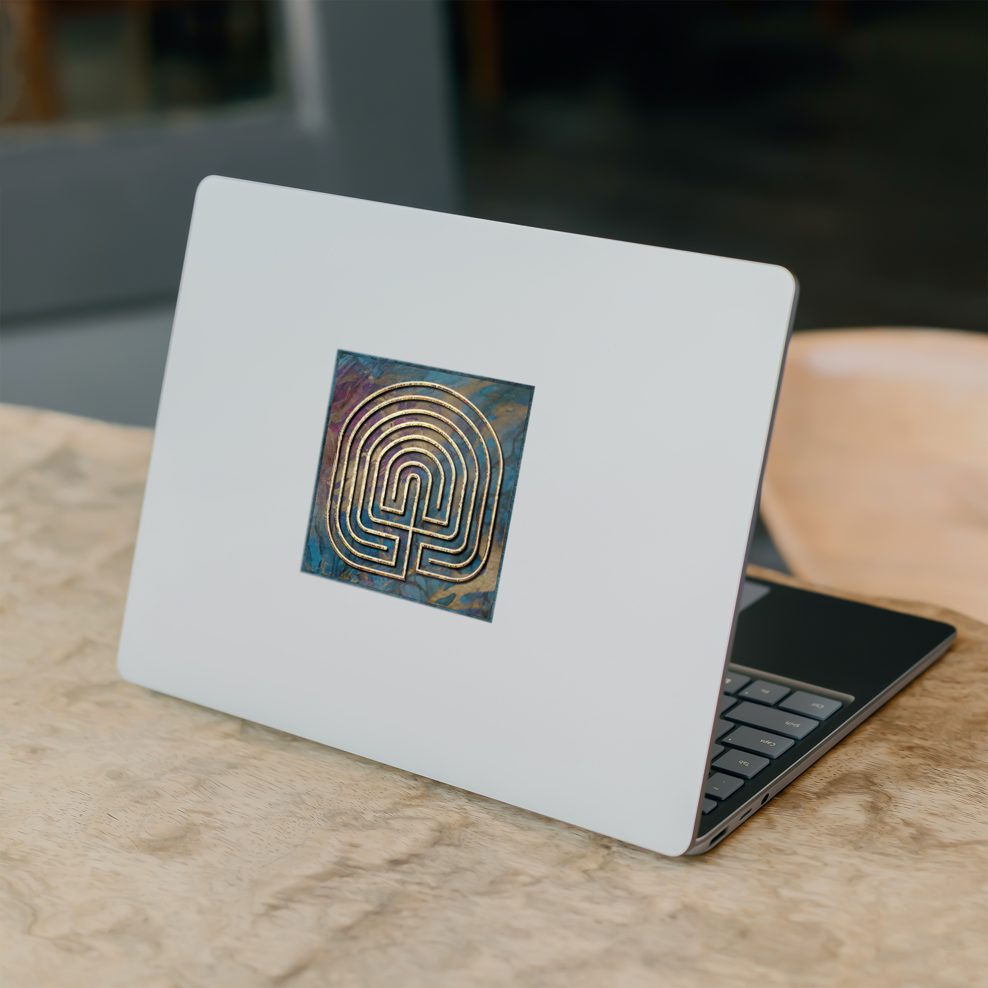 Seed_Labyrinth_Sticker_WhiteSquareSticker_Laptop_Mockup.png
