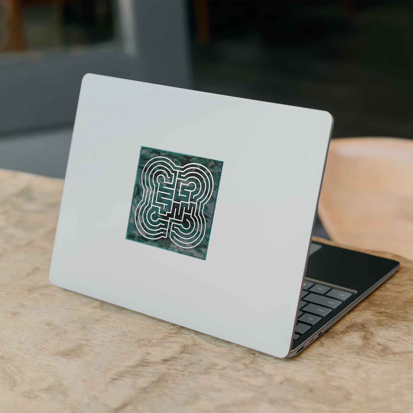 Simple_Commelyn_Labyrinth_Sticker_WhiteSquareSticker_Laptop_Mockup.png