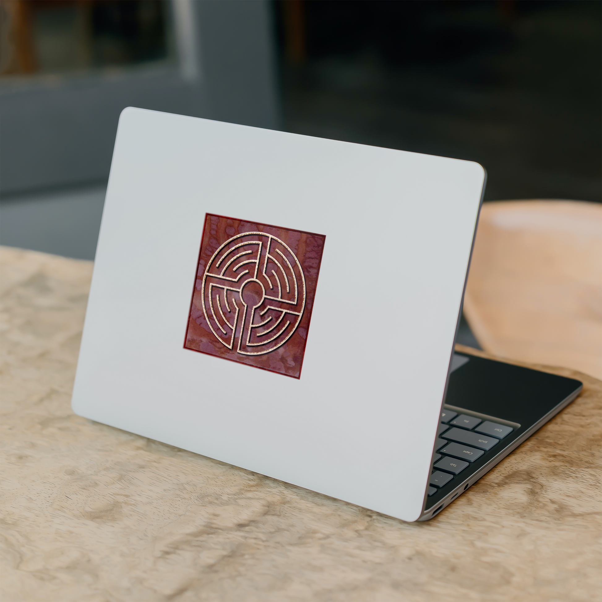 St_Lambertus_Labyrinth_Sticker_WhiteSquareSticker_Laptop_Mockup.png